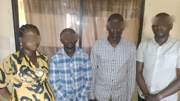 Four microfinance staff