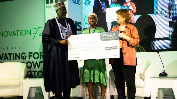 Engr. Sulieman Hussein Adamu, Honorable Minister of Water Resources. Ms. Ameedat Olaniyan founder Sparklean Station, Dr. Jane Bevan Chief WASH, UNICEF NIgeria
