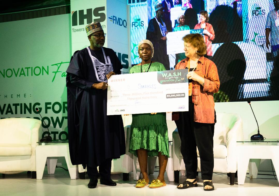 Engr. Sulieman Hussein Adamu, Honorable Minister of Water Resources. Ms. Ameedat Olaniyan founder Sparklean Station, Dr. Jane Bevan Chief WASH, UNICEF NIgeria