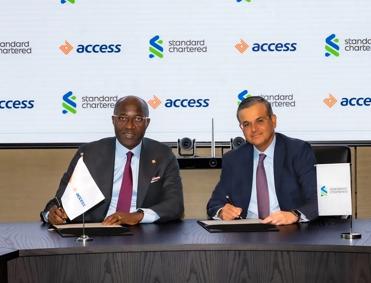 L-R: Roosevelt Ogbonna, Group Managing Director, Access Bank Plc, and Sunil Kaushal, Regional CEO, Africa & Middle East, Standard Chartered at the signing of agreements for Access Bank’s acquisition of Standard Chartered’s shareholding in its subsidiaries in Angola, Cameroon, The Gambia, and Sierra Leone, and its Tanzanian Consumer, Private & Business Banking business in London on Friday.