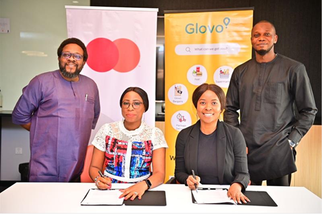 L-R: Akintunde Ajayi, Director, Business Development, Fintech & Enablers, EEMEA, Mastercard; Folasade Femi-Lawal, Country Manager, West Africa, Mastercard; Lamide Akinola, General Manager, Glovo Nigeria; and Kolawole Adeniyi, Head of Q-commerce, Glovo Nigeria, commemorate their agreement to provide over 300,000 meals for school children in Nigeria and Kenya.