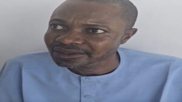 Adeniyi Adeyemi, alleged Director-General of the Presidential Foreign Intervention Promotion Council (PFIPC), arrested over forgery, fraud and impersonation charges.
