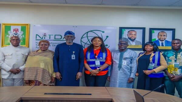 Mr. Oladejo Olawunmi, Director, Digital Development Services representing the Director General of NITDA, and the Executive Director of Cal-Maji Foundation, alongside members of their respective delegations, pose for a group photograph following a strategic engagement on advancing digital literacy, capacity building, and digital inclusion for women, youth, and underserved communities.