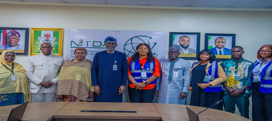 Mr. Oladejo Olawunmi, Director, Digital Development Services representing the Director General of NITDA, and the Executive Director of Cal-Maji Foundation, alongside members of their respective delegations, pose for a group photograph following a strategic engagement on advancing digital literacy, capacity building, and digital inclusion for women, youth, and underserved communities.