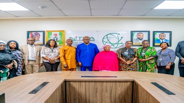 Dr Aristotle Onumo and some NITDA staff, pose for a group photograph with the President of the National Association of Women Journalists (NAWOJ), Comrade Aisha Ibrahim, and members of the delegation following a strategic engagement at the Agency’s Headquarters in Abuja.