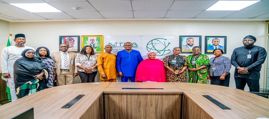 Dr Aristotle Onumo and some NITDA staff, pose for a group photograph with the President of the National Association of Women Journalists (NAWOJ), Comrade Aisha Ibrahim, and members of the delegation following a strategic engagement at the Agency’s Headquarters in Abuja.