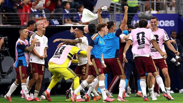 Spain players celebrate after defeating France 2-0 in the FIFA World Cup semifinal to qualify for the final.