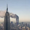 25 years after 9/11 attack, US panel demands fresh security reforms September 11, 2026 10:20 am 25 years after 9/11 attack, US panel demands fresh security reforms The twin towers of the World Trade Center burn behind the Empire State Building in New York, Sept. 11, 2001. In a horrific sequence of destruction, terrorists crashed two planes into the World Trade Center causing the twin 110-story towers to collapse. (AP Photo/Marty Lederhandler)