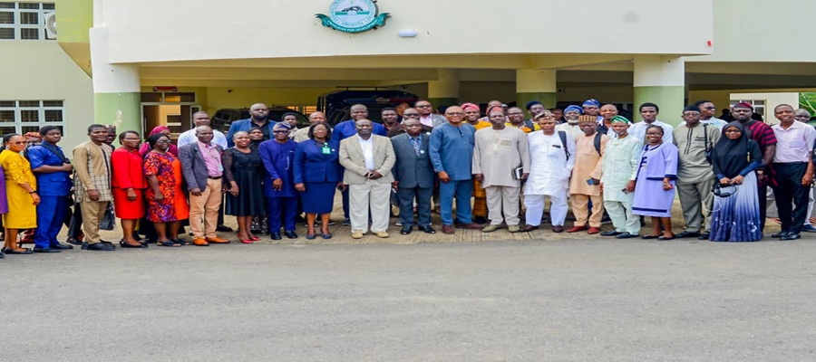 Group photo of DG NITDA represented by Director, Special Duties department, Dr Aristotle Onumo (middle) alongside management staff of thr university during the 3rd International Biennial COLPHYS 2026