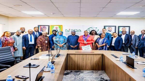 Group photo of DG NITDA, Kashifu Inuwa CCIE, (middle), alongside management staff of NITDA and the U.S. Chamber of Commerce delegation