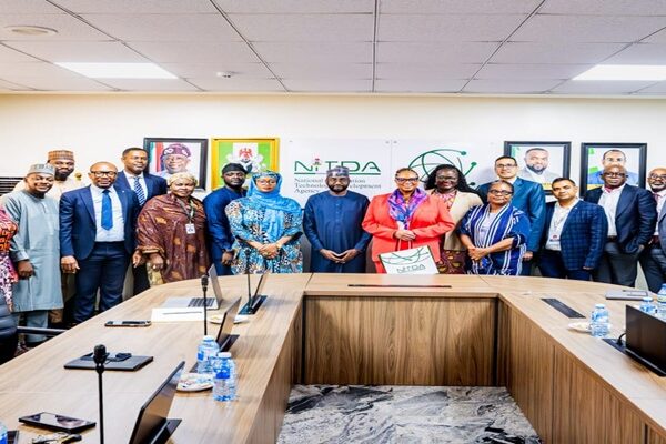 Group photo of DG NITDA, Kashifu Inuwa CCIE, (middle), alongside management staff of NITDA and the U.S. Chamber of Commerce delegation