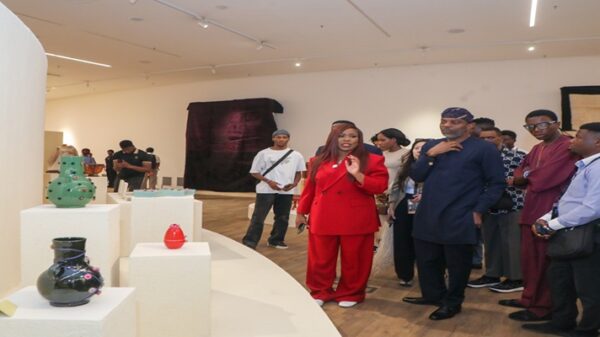 Founder of Design Week Lagos, Titi Ogufere, during an exhibition tour with Journalists.